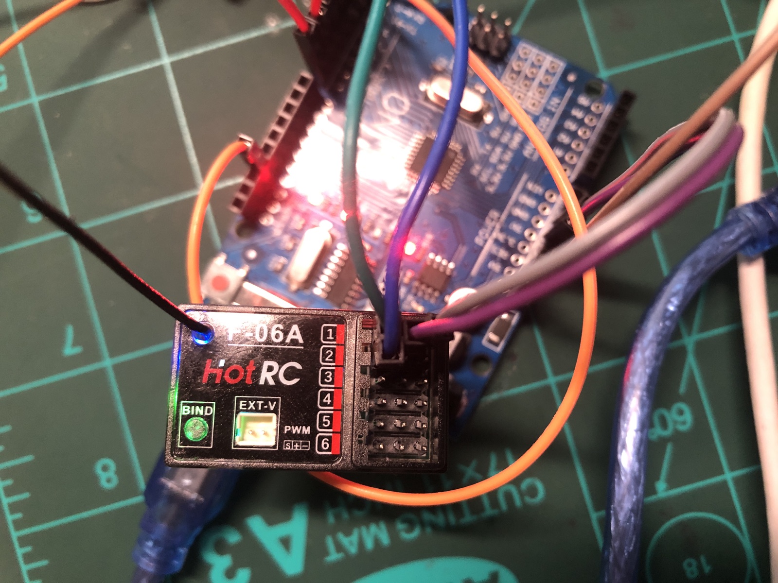 HotRC F-06A six-channel PWM receiver connected beside the Arduino Uno